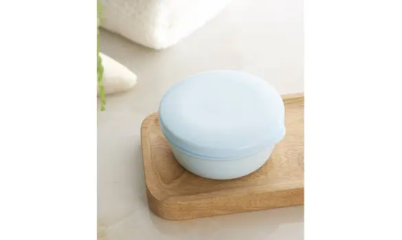 Boîte à savon bleue avec égouttoir
